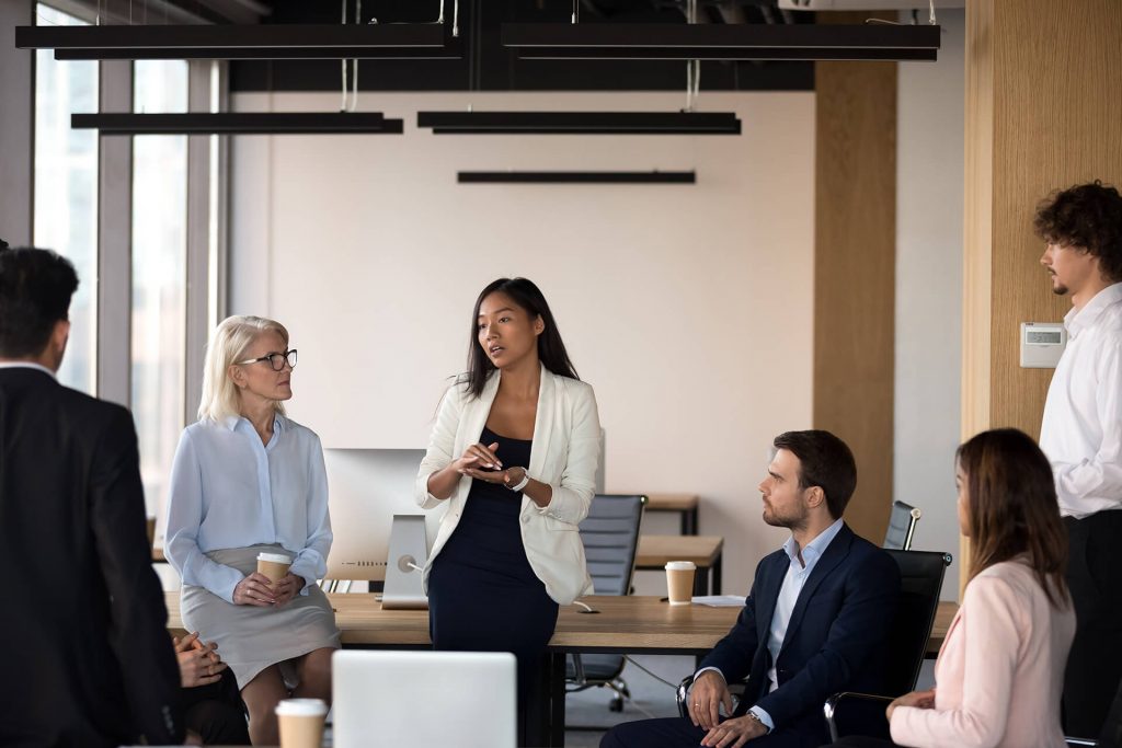 Group of 6 individuals in business meeting